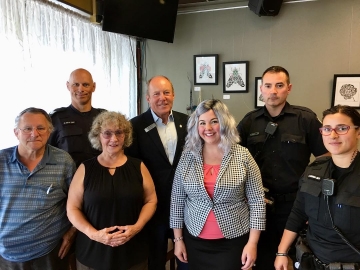 Attending Coffee With a Cop at The Carrot Cafe - July 4, 2018