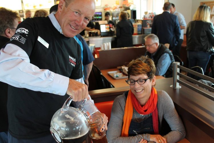Kerry serving root beer at Burgers to Beat MS